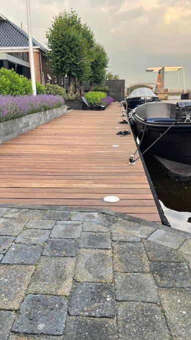 Oostermeer Puur Eastermar - Monumentaal, Authentiek En Luxe Koetshuis Aan Open Vaarwater Met Jacuzzi En Sauna מראה חיצוני תמונה