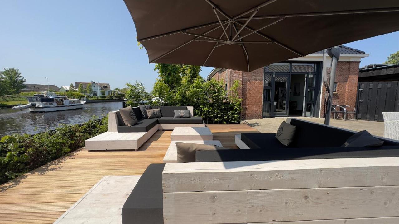 Oostermeer Puur Eastermar - Monumentaal, Authentiek En Luxe Koetshuis Aan Open Vaarwater Met Jacuzzi En Sauna מראה חיצוני תמונה